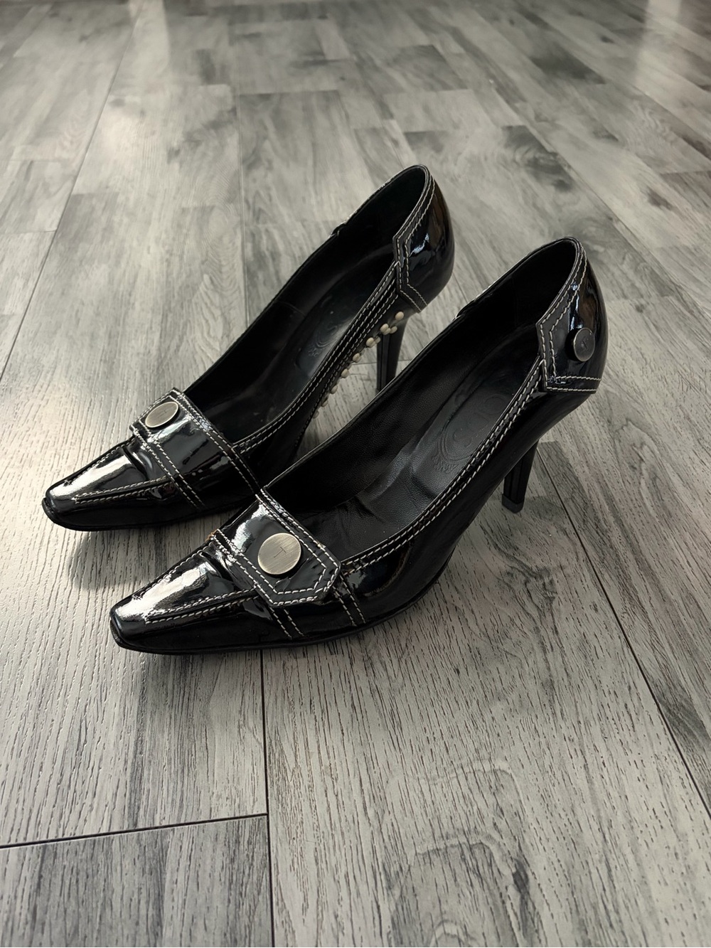 Tod's Black Patent Pointed-Toe Pumps with Silver Button Detail